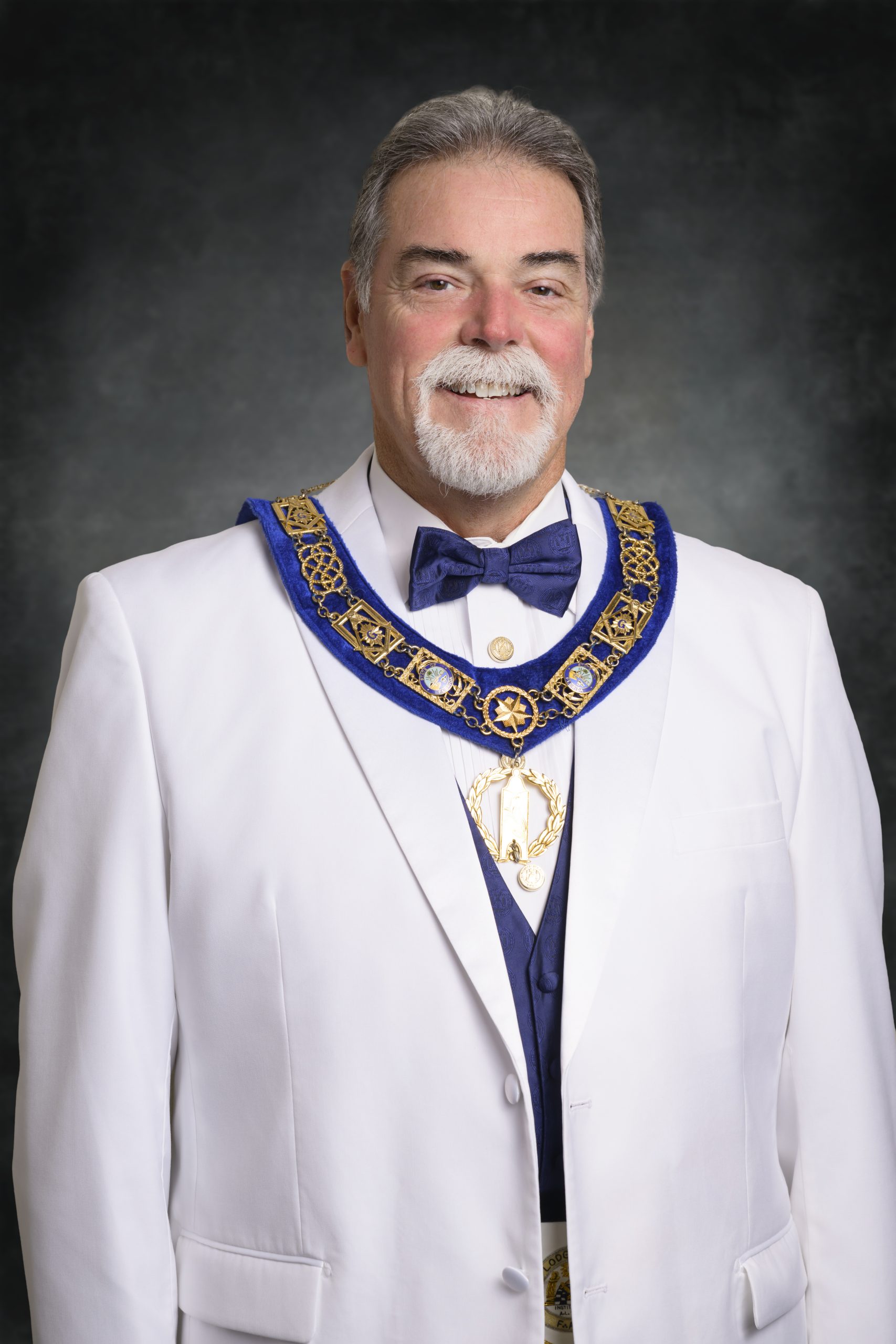 R∴W∴ John N. Dragneff, Junior Grand Warden of the Grand Lodge of Florida, in formal Masonic regalia